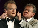 Same same, but different: Hugh Bonneville, who plays Downtown Abbey's Lord Grantham, gets up close and personal with his new wax figure at Madame Tussauds