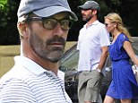 Jon Hamm ditches the Mad Men glamour for scruffy beard and geek specs on Central Park stroll with girlfriend Jennifer Westfeldt