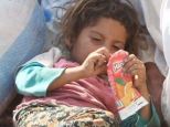 Desperate: Displaced Yazidis are clawing for food and drink to stay alive in the desert, with children allegedly drinking their parents' blood