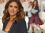 Ready for Fall: Jessica Alba showed off her sculpted legs in a flowing burgundy skirt as she stepped out in New York City Wednesday