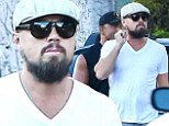 Leonardo DiCaprio goes incognito with cap, sunglasses and scruffy beard as he steps out in Beverly Hills