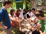 BDATTD Indonesia Sulawesi Buton Labundo Bundo Operation Wallacea volunteers relaxing playing cards with village doctors
