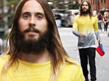 Colourful character: Jared Leto sported a yellow and bluish grey tie-dye blouse as he wandered around New York City on Sunday