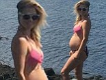 'Bumpin': Legends star Ali Larter shows off growing baby bump in bikini-clad photo taken by her husband