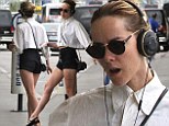Rocking out: Jena Malone put on a spontaneous public performance while taking a cigarette break outside of the Los Angeles airport on Tuesday