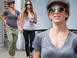 Complementary couple: Jillian Michaels and Heidi Rhoades stroll hand-in-hand through New York clad in similar casual ensembles and sunglasses