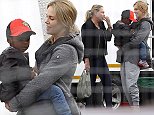 EXCLUSIVE FAO DAILY MAIL ONLINE ONLY
 Mandatory Credit: Photo by Tania Coetzee/REX (4079037c)
 Charlize Theron with Son Jackson and Mother Gerda
 Charlize Theron in Cape Town, South Africa - 19 Aug 2014
 While working on a hectic shooting schedule, Charlize Theron took a quick break between scenes to take her son Jackson and mother Gerda to an interactive "Days of the Dinosaur" Exhibit at the Cape Town Convention Centre, where Jackson was entertained and by roaring, moving, life-sized dinosaurs. Onlookers said he looked hesitant initially but was soon laughing and screeching at the monsters on display. Charlize made the most of her quality time with her mother and son, laughing and chatting with them and and some crew members before heading back to work.  Theron is filming "The Last Face" alongside Javier Bardem, while Sean Penn directs. Penn was seen pacing outside the set constantly puffing away on a cigarette.