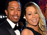 A day after Nick Cannon admitted he was not living with his wife Mariah Carey, her rep told UsWeekly that the singing icon 'is focusing on her children'