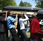 Pallbearers carry the casket of Michael Brown at St Peter's cemetery