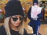 Vanessa Hudgens shows off pins in leggings and dons work-out gear as she grabs groceries from market