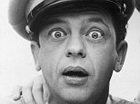 circa 1965:  American actor Don Knotts looks at the camera with a surprised expression, as Andy Griffith holds his hand on his shoulder, posing in character as Deputy Barney Fife and Sheriff Andy Taylor in a publicity still for the television series, 'The Andy Griffith Show'.  (Photo by Hulton Archive/Getty Images)