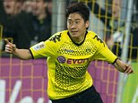 epa04373731 (FILES) A file picture dated 30 March 2012 of Shinji Kagawa of Borussia Dortmund celebrating after scoring the opening goal during the German Bundesliga soccer match between Borussia Dortmund and VfB Stuttgart in Dortmund, Germany. Bundesliga club Borussia Dortmund are close to re-signing Japan midfielder Shinji Kagawa after he had two mostly unsuccessful years at Manchester United. Talks between the clubs are in an advanced stage, according to German and British news reports 29 August 2014.  EPA/BERND THISSEN