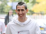 Man Uniteds record signing Angel Di Maria walks back to The Lowry Hotel on Wednesday afternoon after having lunch at San Carlo Italian Restaurant ........27.8.14.