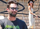 Will she make an appearance? Inseparable newlyweds Adam Levine and Behati Prinsloo on set of Maroon 5 music video