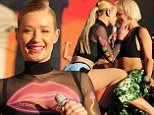 Iggy Azalea and Rita Ora tease fans with an almost kiss as they lead performances at the Budweiser Made In America Festival