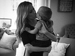 'Kisses from my little man before date night with the big one': Doting mom Kristin Cavallari shares adorable photo as she cuddles with son Camden