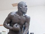 Mirror: A statue of Joe Frazier, showing him throwing a left hook against Muhammad Ali, is almost complete