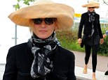 Flour power! Uma Thurman rocks a striking cream hat reminiscent of a puff pastry as she jets out of Venice