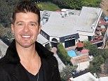 'Drunk' Robin Thicke gets ticket from police for playing loud music at his Hollywood mansion