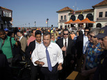FILE - In this Thursday, Aug. 14, 2014, file photo, New Jersey Gov. Chris Christie walks along a boardwalk after a town hall meeting in Ocean City, N.J. Chri...
