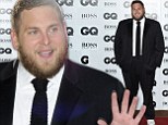 Living large in London! Jonah Hill shows off his bigger build as he scoops GQ International Man Of The Year award