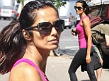 Padma Lakshmi heads out to the gym in bright, pink workout attire