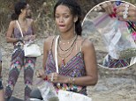 Rihanna stands out in multi-patterned jumpsuit as she carries plastic bag of suspicious looking substances during Mediterranean holiday