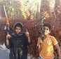 Shocking: This photo, showing two young boys pointing machine guns toward the sky, was posted on the social networking site Twitter. Its accompanying message reads 'Two young mujahideen for ISIS; not only than 14'