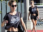 Keeping it brief! Kate Hudson displays svelte figure in cropped T-shirt and tiny shorts on shopping spree