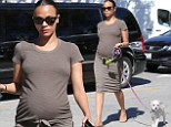 Pregnant Zoe Saldana shows off her growing bump after grabbing In-N-Out burger while out with adorable pup Mugsy