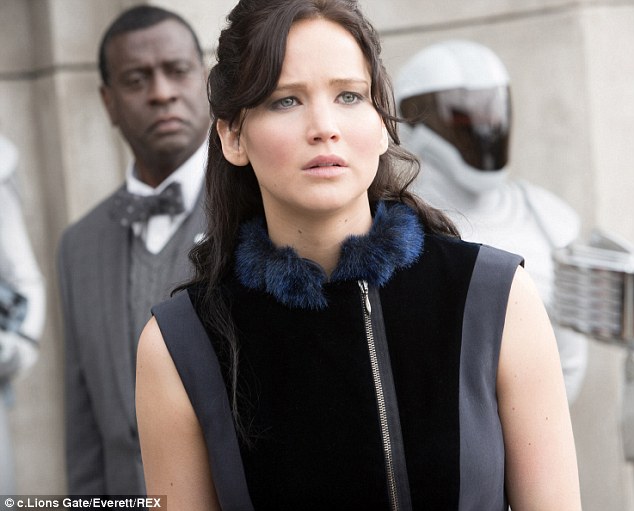 Concerned about the future: Jennifer as Katniss in The Hunger Games: Catching Fire, the second in the four-film franchise, released last September