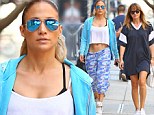 Impressive: Jennifer Lopez flaunted her rock solid stomach in a crop top paired with blue camouflage sweatpants as she left the gym in New York City with a gal pal on Friday