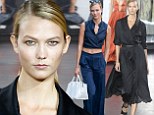 Karlie Kloss wows in black dress during Jason Wu fashion show after sexy outing in blue crop top and trousers