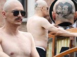 James Franco sports Elizabeth Taylor and Montgomery Clift tattoo on the back of his shaved head for new film role... as he displays a fuller physique during shirtless boat ride