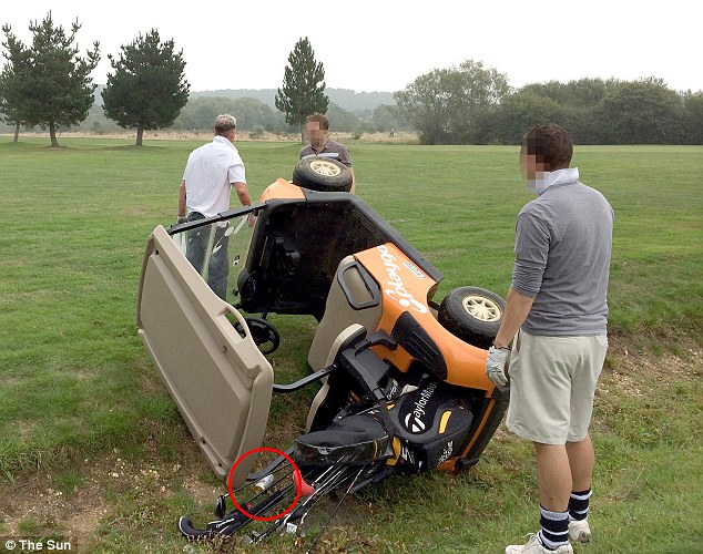 Crash: Paul Gascoigne (left) had to be helped after crashing his golf buggy - a beer can be seen on the ground