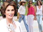 The before and afters! Always the supermodel Cindy Crawford makes rollers look good before wearing three different beach chic ensembles for new commercial