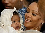 That's her girl! Rihanna was looking every inch the besotted Aunty OhNaNa during the Christening