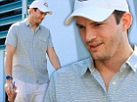 Soon-to-be dad Ashton Kutcher beats the LA heat as he grabs an iced coffee on solo outing
