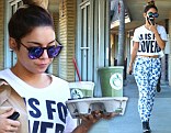 Vanessa Hudgens flashes her taut tummy in statement crop top and floral pants while grabbing a healthy lunch