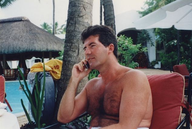 'I've had a new idea called the X Factor': A young Simon Cowell does business by the pool