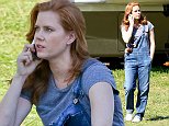 UK CLIENTS MUST CREDIT: AKM-GSI ONLY
EXCLUSIVE: Actress and busy mother Amy Adams was spotted on the 'Batman v Superman: Dawn of Justice' set this afternoon while filming on location in Detroit, MI. The redhead talked on the phone after lunch and even sat down for a few minutes before returning to work. She wore a simple gray tee with denim overalls and white Converse sneakers.

Pictured: Amy Adams
Ref: SPL854174  290914   EXCLUSIVE
Picture by: AKM-GSI