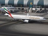 DRK9XM Emirates Airlines Airbus A330-200 taxiing out for departure from Dubai International Airport, UAE