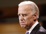 Vice President Joe Biden bites his lip while speaking to students faculty and staff at Harvard University's Kennedy School of Government in Cambridge, Mass. Thursday, Oct. 2, 2014. (AP Photo/Winslow Townson)