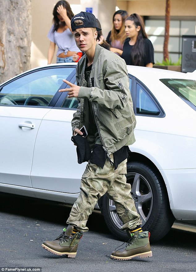 Peaceful moment: Justin Bieber was in a peaceful mood during an outing in Beverly Hills on Friday while clad in camouflage clothing