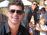 Robin Thicke arrives at Mr Bones pumpkin patch with his son.\nFeaturing: Robin Thicke,Julian Thicke\nWhere: Los Angeles, California, United States\nWhen: 18 Oct 2014\nCredit: WENN.com