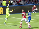Costa lifts the ball over Wojciech Szczesny to wrap up three points against Arsenal at Stamford Bridge