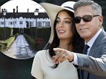 George Clooney, right, flanked by his wife Amal Alamuddin, arrives at the Cavalli Palace for the civil marriage ceremony in Venice, Italy, Monday, Sept. 29, 2014. George Clooney married human rights lawyer Amal Alamuddin Saturday, the actor's representative said, out of sight of pursuing paparazzi and adoring crowds. (AP Photo/Luca Bruno)