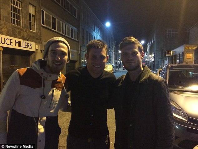 England international James Milner, pictured with two locals, was  in Aberdeen on Monday night