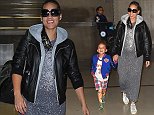 Los Angeles, CA - Alicia Keys smiles wide as she makes her way through LAX Airport with her son Egypt following a late flight into Los Angeles.  Alicia, who is pregnant with her second child, is currently a mentor to Pharrell Williams   team on   The Voice  .  The braided R&B singer wore a black leather jacket over a splatter painted grey dress, white sneakers and a pair of sunglasses.
 
AKM-GSI        October 22, 2014
To License These Photos, Please Contact :
Steve Ginsburg
(310) 505-8447
(323) 423-9397
steve@akmgsi.com
sales@akmgsi.com
or
Maria Buda
(917) 242-1505
mbuda@akmgsi.com
ginsburgspalyinc@gmail.com
