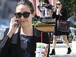 UK CLIENTS MUST CREDIT: AKM-GSI ONLY\nEXCLUSIVE: Emmy Rossum left the gym on Wednesday afternoon, sipping a smoothie after an intense workout. The 'Shameless' actress looked flawless in a floral mini dress and suede blazer, despite the fact that she wore no makeup and kept her wet hair pulled back in a tight bun. Rossum was all smiles as she chatted on the phone and toted a Christian Louboutin purse as her gym bag.\n\nPictured: Emmy Rossum\nRef: SPL872464  221014   EXCLUSIVE\nPicture by: AKM-GSI  \n\n